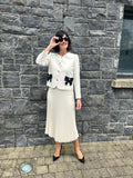 Ivory boucle black bow jacket
